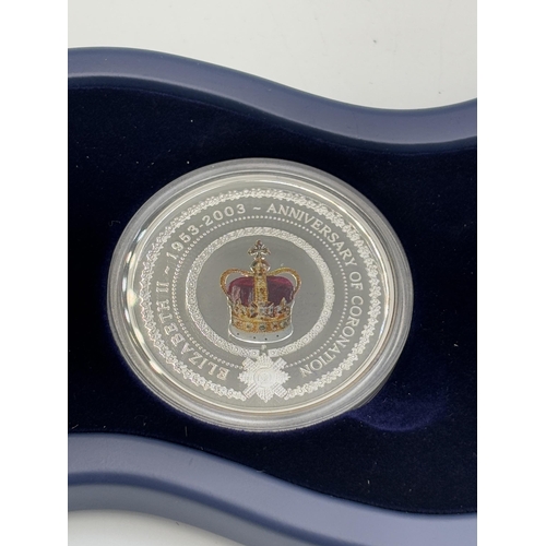 2358 - A boxed The Perth Mint Her Majesty Queen Elizabeth II Golden Jubilee of Coronation 1953-2003 1oz $1 ... 