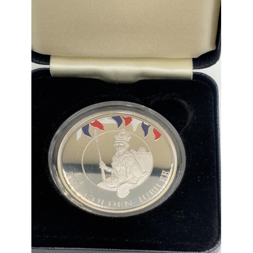 2360 - A boxed Valcambi sa, Switzerland Falkland Islands 'The Golden Jubilee Coronation Regalia' 50p proof ... 