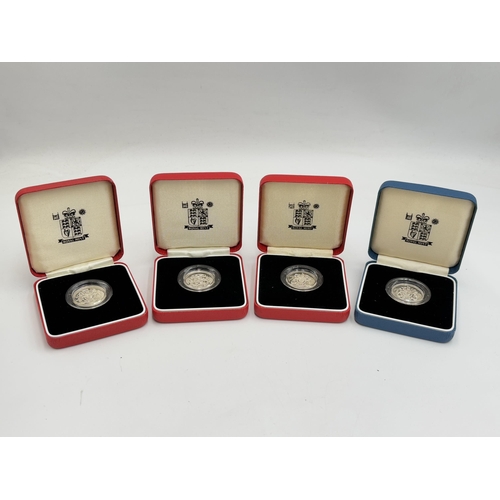 2364 - Four boxed Royal Mint United Kingdom .925 silver proof Piedfort £1 coins with certificates of authen... 