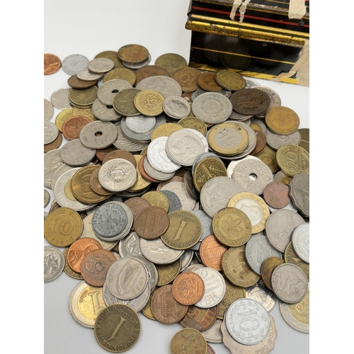 2370 - A cash tin containing a collection of world banknotes and coins to include 83.5% silver 1917 French ... 