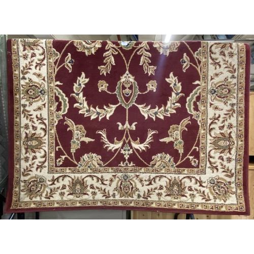 191 - A Dunelm Legacy red ground rug - approx. 237cm x 160cm