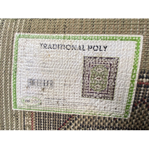 192 - A Belgian Rug Style Traditional Poly Malak green ground rug - approx. 290cm x 200cm