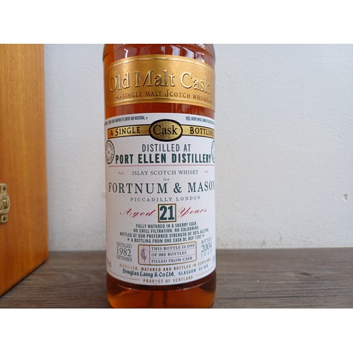 597 - A boxed 70cl bottle of Douglas Laing & Co. Ltd. Port Ellen distillery twenty-one year old 'The Old M... 