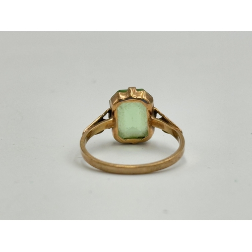 2131 - A 9ct gold green paste solitaire ring - approx. gross weight 1.9g