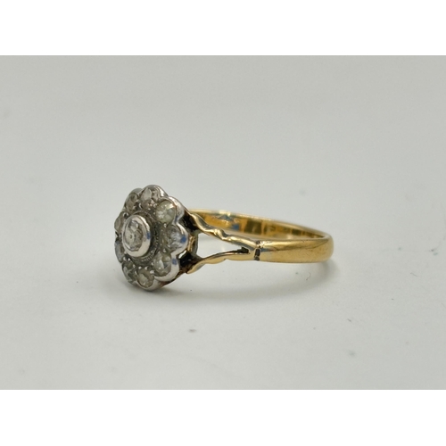 2134 - An antique 9ct gold old cut diamond floral cluster ring, size M½ - approx. gross weight 1.8 grams