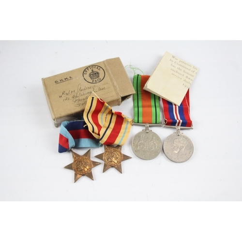 2289 - A boxed WWII medal group comprising 1939-1945 star, Africa Star, Defence and War