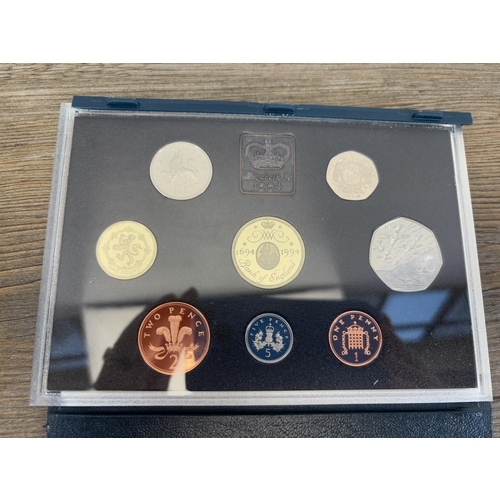 2352 - Four boxed Royal Mint proof coin collections, one 1989, one 1992, one 1994, one 1997