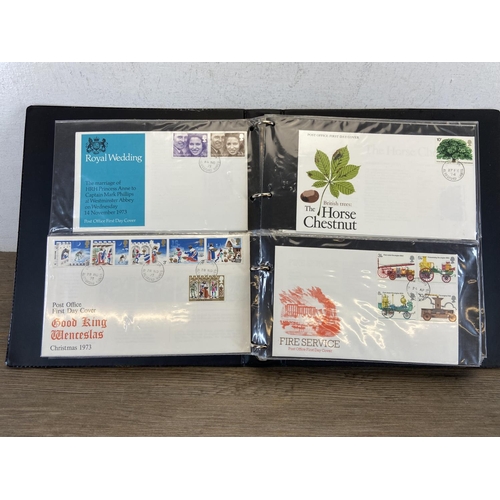 518A - Seven albums containing a large collection of first day covers