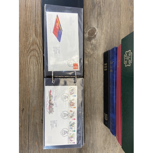 518A - Seven albums containing a large collection of first day covers