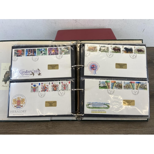 518A - Seven albums containing a large collection of first day covers