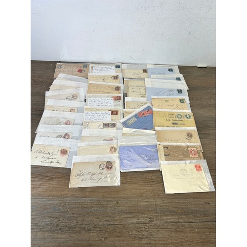 525 - A large collection of 19th century and later letters, envelopes and postcards with stamps to include... 