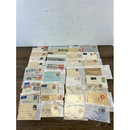 525 - A large collection of 19th century and later letters, envelopes and postcards with stamps to include... 