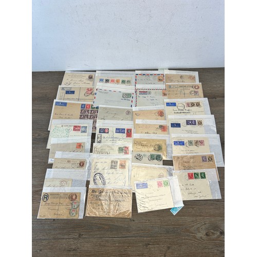 525 - A large collection of 19th century and later letters, envelopes and postcards with stamps to include... 