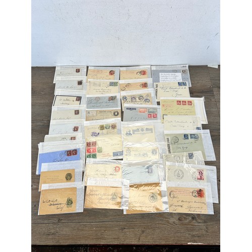 525 - A large collection of 19th century and later letters, envelopes and postcards with stamps to include... 