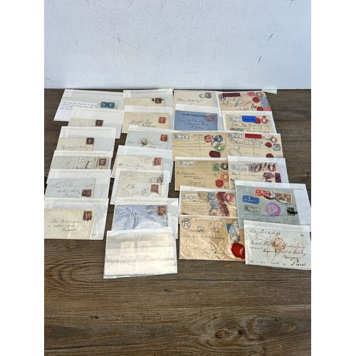 525 - A large collection of 19th century and later letters, envelopes and postcards with stamps to include...