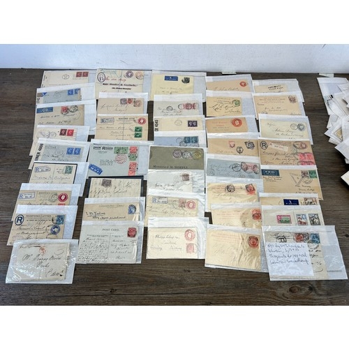 525 - A large collection of 19th century and later letters, envelopes and postcards with stamps to include... 