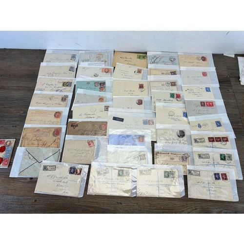 525 - A large collection of 19th century and later letters, envelopes and postcards with stamps to include... 