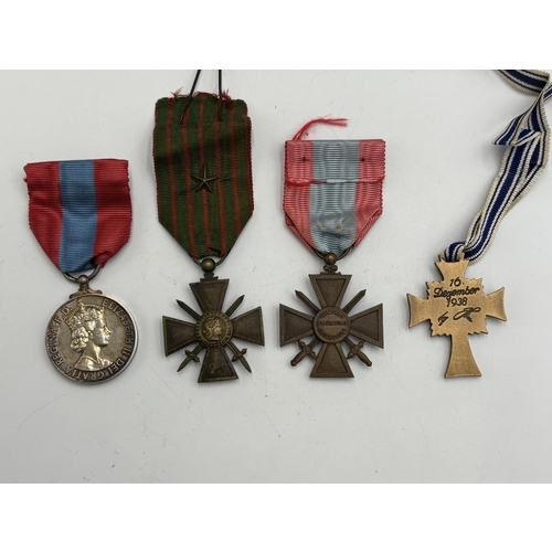 2293 - Four medals, one boxed Imperial Service presented to Edith Vera Norris, two French Croix de Guerre a... 