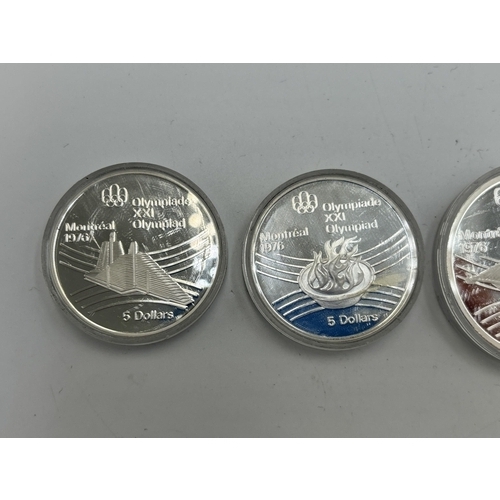 2373A - Four encapsuled 92.5% silver proof 1976 Canada Montréal XXI Olympiad commemorative coins, two ten do... 