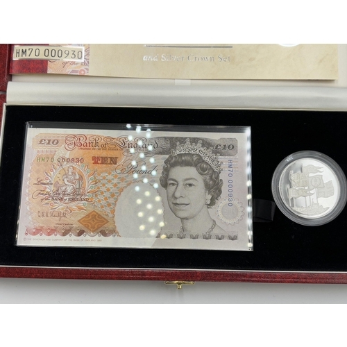 2313 - Two 1996 The Royal Mint coin and banknote sets with certificates of authenticity, one cased 70th Bir... 