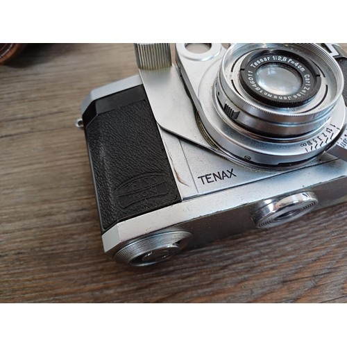 573 - A cased 1938 Zeiss Ikon Tenax II 24x24 35mm rangefinder camera fitted with Tessar 1:2.8 f=4cm lens a... 