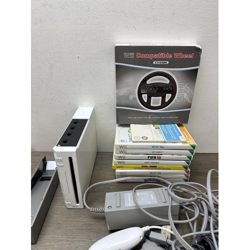 585 - A Nintendo Wii with games and accessories