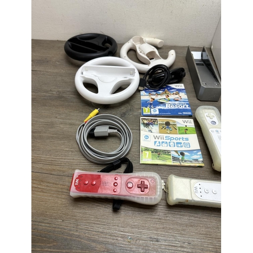 585 - A Nintendo Wii with games and accessories