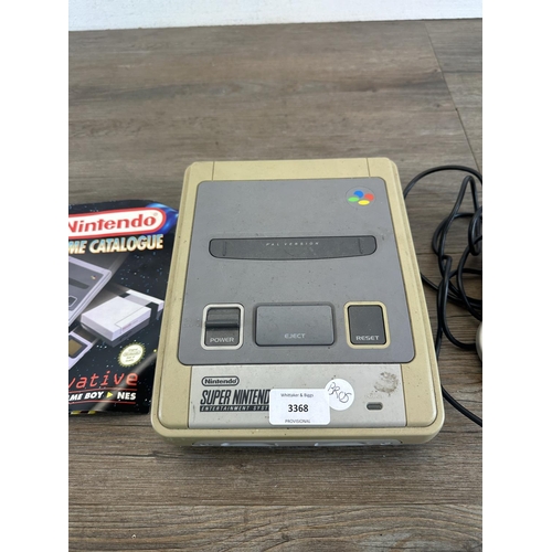 592 - A Super Nintendo Entertainment System with controller