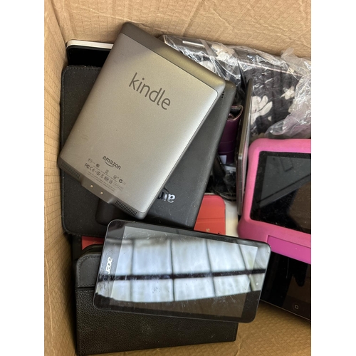 602 - A box of tablets to include Apple, Kindle etc.