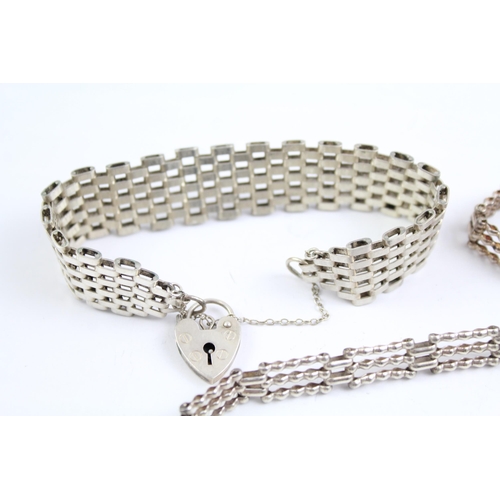 2067 - Three sterling silver gate bracelets with heart padlock clasps - approx. gross weight 43g