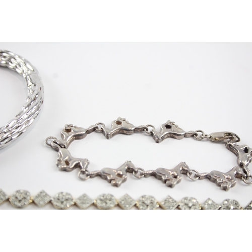 2071 - Four sterling silver bracelets to include gate, bangle, diamond etc. - approx. gross weight 68g