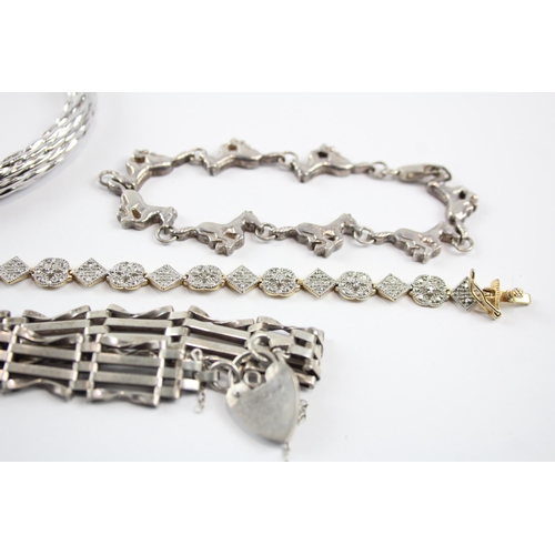 2071 - Four sterling silver bracelets to include gate, bangle, diamond etc. - approx. gross weight 68g