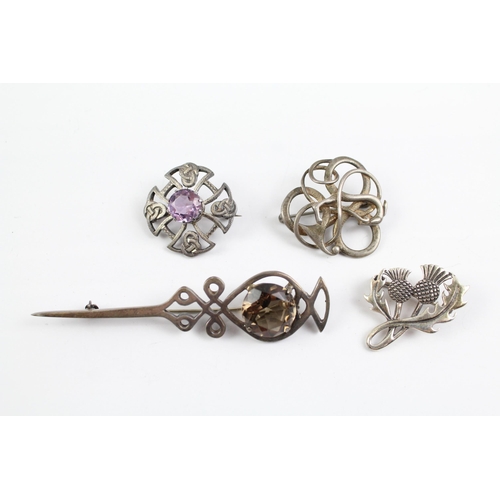 2075 - Four Scottish sterling silver brooches to include Ola Gorie, gemstone etc. - approx. gross weight 34... 