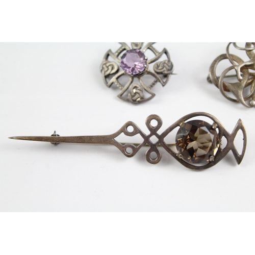 2075 - Four Scottish sterling silver brooches to include Ola Gorie, gemstone etc. - approx. gross weight 34... 