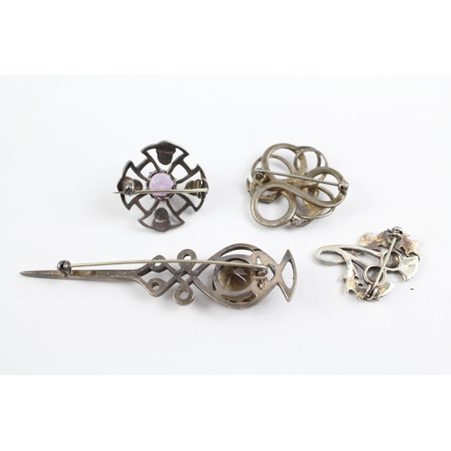 2075 - Four Scottish sterling silver brooches to include Ola Gorie, gemstone etc. - approx. gross weight 34... 