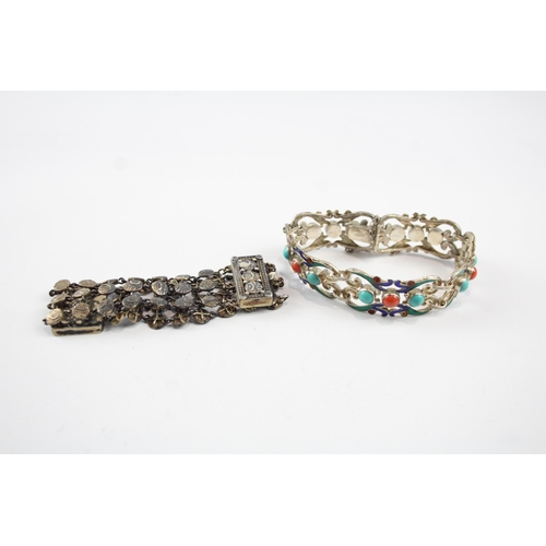 2082 - Two silver bracelets, one Chinese Export and one multi strand - approx. gross weight 57g