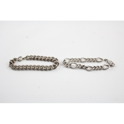 2083 - Two sterling silver chain bracelets, one curb link and one figaro - approx. gross weight 67g