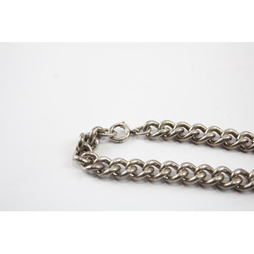 2083 - Two sterling silver chain bracelets, one curb link and one figaro - approx. gross weight 67g