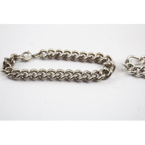 2083 - Two sterling silver chain bracelets, one curb link and one figaro - approx. gross weight 67g