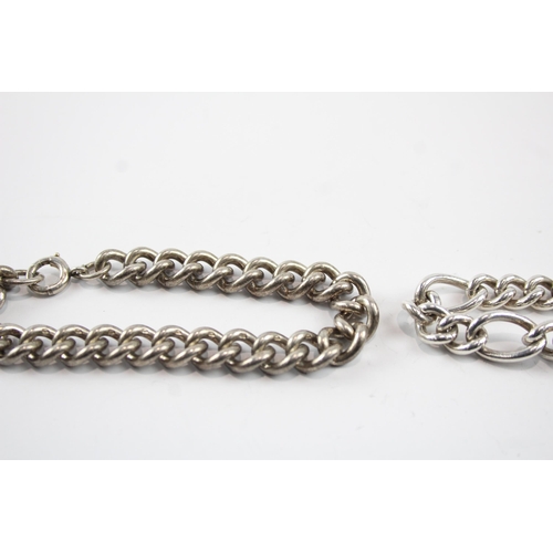 2083 - Two sterling silver chain bracelets, one curb link and one figaro - approx. gross weight 67g