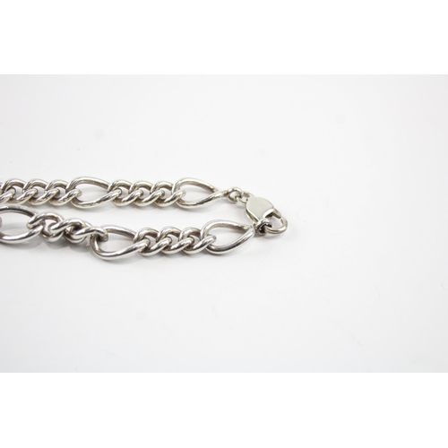 2083 - Two sterling silver chain bracelets, one curb link and one figaro - approx. gross weight 67g