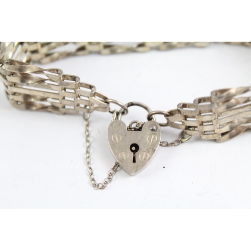 2093 - Two sterling silver gate bracelets with heart padlock clasps - approx. gross weight 40g