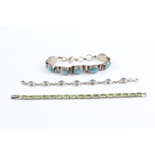 2095 - Three sterling silver gemstone bracelets to include moonstone, peridot - approx. gross weight 76g