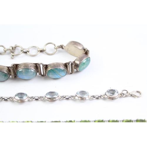 2095 - Three sterling silver gemstone bracelets to include moonstone, peridot - approx. gross weight 76g