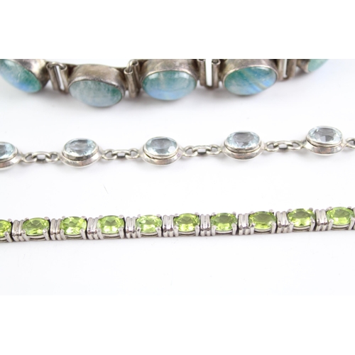 2095 - Three sterling silver gemstone bracelets to include moonstone, peridot - approx. gross weight 76g