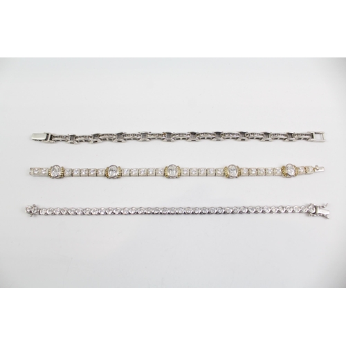 2100 - Three sterling silver CZ bracelets to include tennis etc. - approx. gross weight 48g