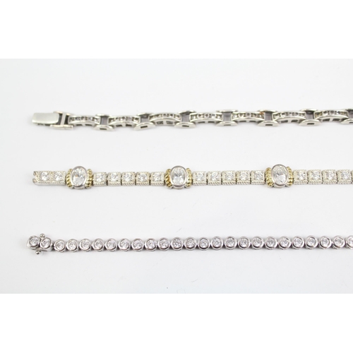 2100 - Three sterling silver CZ bracelets to include tennis etc. - approx. gross weight 48g