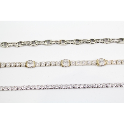 2100 - Three sterling silver CZ bracelets to include tennis etc. - approx. gross weight 48g