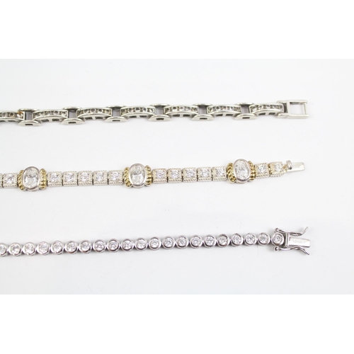 2100 - Three sterling silver CZ bracelets to include tennis etc. - approx. gross weight 48g