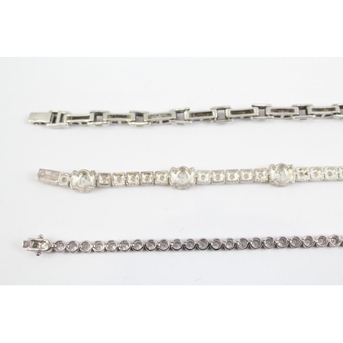 2100 - Three sterling silver CZ bracelets to include tennis etc. - approx. gross weight 48g